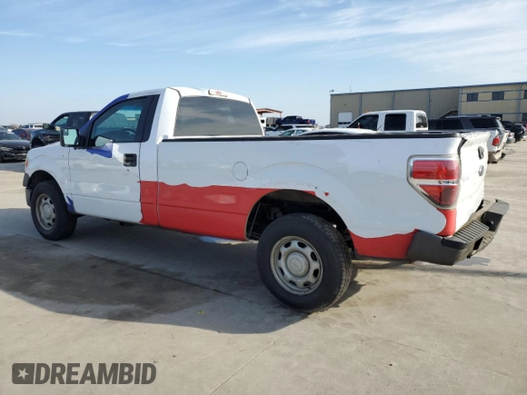 2014 Ford F-150 XL with VIN 1FTMF1CM2EKD70205, listed as a Copart auction lot 43963335 with 214,912 mi miles and Salvage title. Bid and sale history available at DreamBid. Image 2.