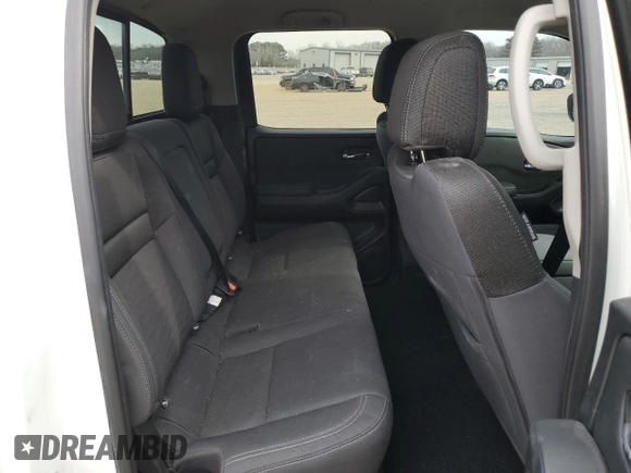 2023 Nissan Frontier SV with VIN 1N6ED1FJ9PN653677, listed as a Copart auction lot 43245835 with 20,594 mi miles and Salvage title. Bid and sale history available at DreamBid. Image 11.