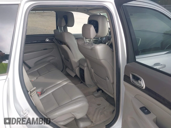 2011 Jeep Grand Cherokee Laredo with VIN 1J4RS4GGXBC564035, listed as a IAAI auction lot 41931861 with 242,291 mi miles and . Bid and sale history available at DreamBid. Image 8.