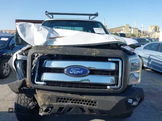 2014 Ford F-350 z VIN 1FT7X3BT4EEA59761, wystawiony jako IAAI lot #42415018 z przebiegiem 104 591 mil mil oraz . Historia ofert i sprzedaży dostępna na DreamBid. Obrazek 12.