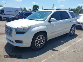 2014 GMC Acadia Denali with VIN 1GKKVTKD1EJ220183, listed as a IAAI auction lot 42230611 with 103,789 mi miles and . Bid and sale history available at carsss.com. Image 2.