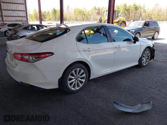 2020 Toyota Camry LE with VIN 4T1C11AK9LU935025, listed as a IAAI auction lot 42054033 with 63,814 mi miles and . Bid and sale history available at carsss.com. Image 4.
