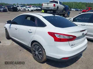 2012 Ford Focus SE with VIN 1FAHP3F24CL207735, listed as a IAAI auction lot 42131828 with 170,044 mi miles and . Bid and sale history available at DreamBid. Image 3.