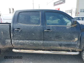 2013 Toyota Tacoma with VIN 3TMMU4FN1DM062090, listed as a IAAI auction lot 41572140 with 246,070 mi miles. Bid and sale history available at carsss.com. Image 13.