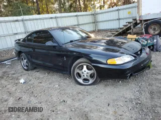 1997 Ford Mustang Cobra with VIN 1FALP47VXVF193303, listed as a Copart auction lot 88025845 with 114,841 mi miles and Salvage Title. Bid and sale history available at carsss.com. Image 4.
