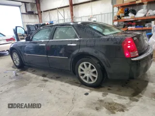 2010 Chrysler 300 with VIN 2C3CA6CT0AH199894, listed as a Copart auction lot 88086835 with 170,060 mi miles and Salvage Title. Bid and sale history available at carsss.com. Image 2.