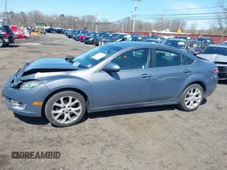 2009 Mazda 6 S Grand Touring with VIN 1YVHP82B795M01762, listed as a IAAI auction lot 41925269 with 163,967 mi miles and . Bid and sale history available at DreamBid. Image 14.