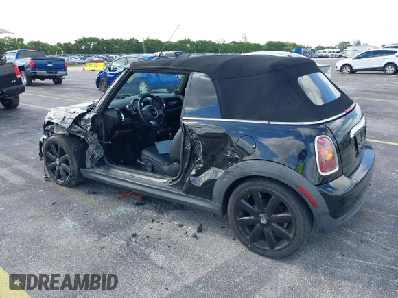 2010 MINI Convertible with VIN WMWMR3C54ATU96904, listed as a IAAI auction lot 39151247 with 109,019 mi miles and . Bid and sale history available at DreamBid. Image 3.