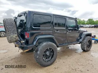 2015 Jeep Wrangler Unlimited Rubicon Hard Rock with VIN 1C4HJWFG1FL710264, listed as a Copart auction lot 54123285 with 96,737 mi miles and Salvage title. Bid and sale history available at DreamBid. Image 3.