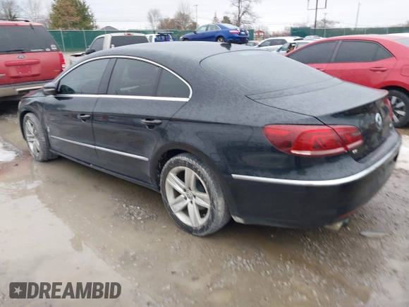 2013 Volkswagen CC Sport with VIN WVWBP7AN2DE506977, listed as a IAAI auction lot 41440929 with 62,385 mi miles. Bid and sale history available at carsss.com. Image 3.