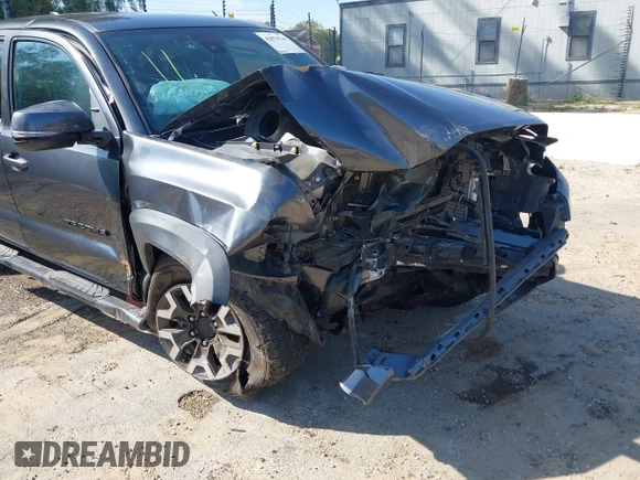 2021 Toyota Tacoma SR5 z VIN 3TMDZ5BN8MM117163, wystawiony jako IAAI lot #42070540 z przebiegiem 12 790 mil mil oraz . Historia ofert i sprzedaży dostępna na DreamBid. Obrazek 6.