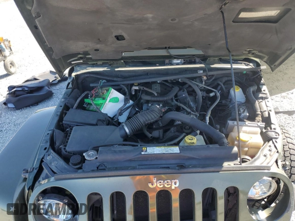 2008 Jeep Wrangler Unlimited Sahara with VIN 1J4GA59148L504608, listed as a Copart auction lot 52400325 with 123,959 mi miles and Salvage Title. Bid and sale history available at carsss.com. Image 14.