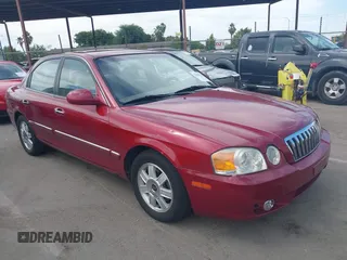 2003 Kia Optima LX z VIN KNAGD126135232508, wystawiony jako IAAI lot #42630724 z przebiegiem 93 466 mil mil oraz . Historia ofert i sprzedaży dostępna na DreamBid. Obrazek 1.