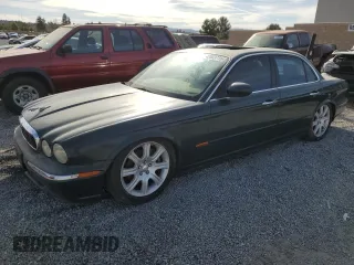2004 Jaguar XJ with VIN SAJWA71C34SG29498, listed as a Copart auction lot 42653715 with 116,956 mi miles and Salvage Title. Bid and sale history available at carsss.com. Image 1.