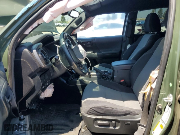2021 Toyota Tacoma SR5 z VIN 3TMAZ5CN6MM157145, wystawiony jako Copart lot #51641085 z przebiegiem Nie podano mil oraz Szkoda całkowita • Salvage title. Historia ofert i sprzedaży dostępna na DreamBid. Obrazek 7.