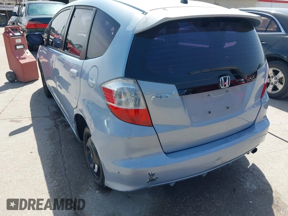 2009 Honda Fit with VIN JHMGE88289S004009, listed as a IAAI auction lot 41803838 with 194,304 mi miles. Bid and sale history available at carsss.com. Image 6.