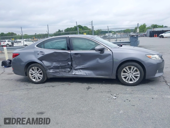 2015 Lexus ES 330 z VIN JTHBK1GG6F2153506, wystawiony jako IAAI lot #42357576 z przebiegiem 142 795 mil mil oraz . Historia ofert i sprzedaży dostępna na DreamBid. Obrazek 13.