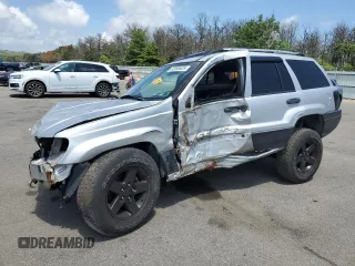 2004 Jeep Grand Cherokee Laredo with VIN 1J4GW48S34C159099, listed as a Copart auction lot 62958425 with 127,005 mi miles and Salvage title. Bid and sale history available at DreamBid. Image 1.