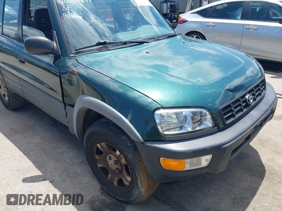 1998 Toyota RAV4 with VIN JT3GP10V6W0023680, listed as a IAAI auction lot 42235877 with 244,446 mi miles and . Bid and sale history available at DreamBid. Image 16.