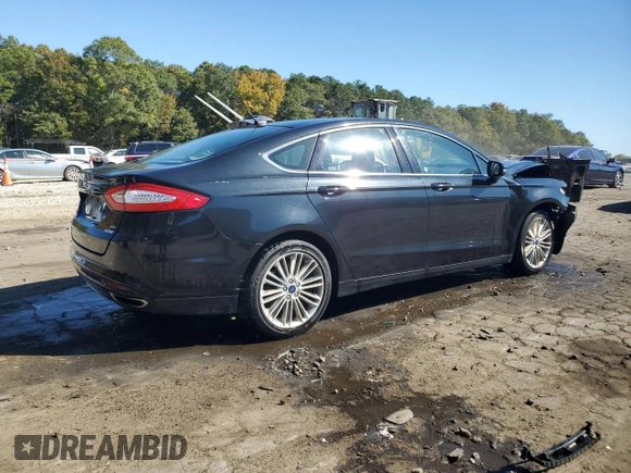 2014 Ford Fusion SE with VIN 3FA6P0H90ER323616, listed as a Copart auction lot 77161924 with 69,699 mi miles and Salvage Title. Bid and sale history available at carsss.com. Image 3.