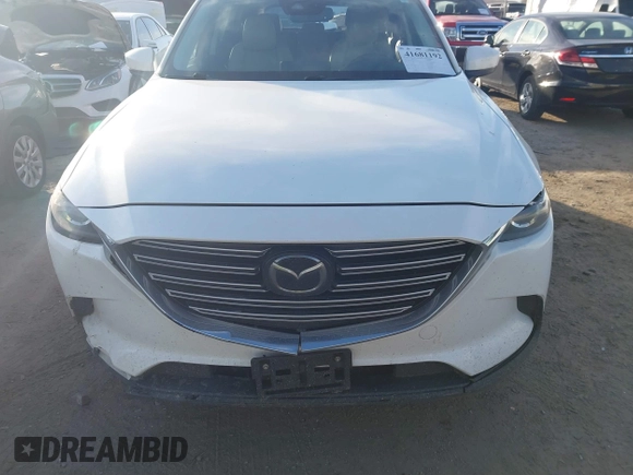 2021 Mazda CX-9 Touring with VIN JM3TCBCY1M0507696, listed as a IAAI auction lot 41681192 with 69,330 mi miles. Bid and sale history available at carsss.com. Image 13.