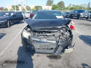 2012 Ford Focus SE with VIN 1FAHP3F26CL236976, listed as a IAAI auction lot 42302561 with 177,476 mi miles and . Bid and sale history available at DreamBid. Image 12.