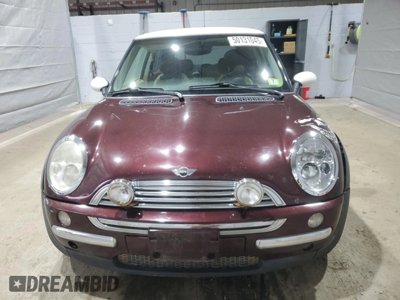 2002 MINI Hardtop with VIN WMWRC33402TC36986, listed as a Copart auction lot 50131045 with 194,224 mi miles and Salvage Title. Bid and sale history available at DreamBid. Image 5.