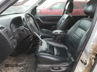 2004 Ford Escape Limited with VIN 1FMCU94184KB62778, listed as a Copart auction lot 70992184 with 165,199 mi miles and Salvage Title. Bid and sale history available at carsss.com. Image 7.