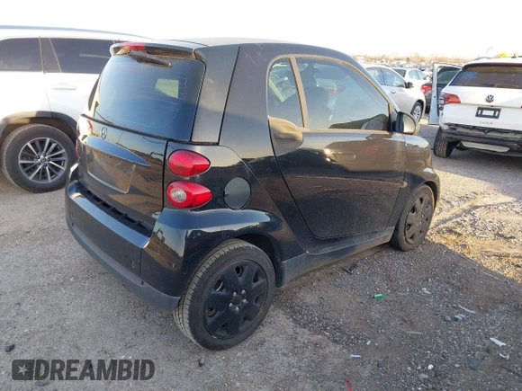 2009 Smart fortwo Pure с VIN WMEEJ31X69K331684, выставлен на аукционе IAAI как лот 41770804 с пробегом 112 611 миль миль и . История ставок и продаж доступна на DreamBid. Изображение 4.