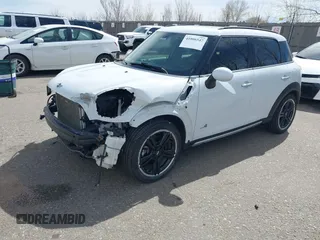 2016 MINI Countryman S with VIN WMWZC5C57GWU22015, listed as a IAAI auction lot 41806547 with 65,124 mi miles and . Bid and sale history available at DreamBid. Image 2.