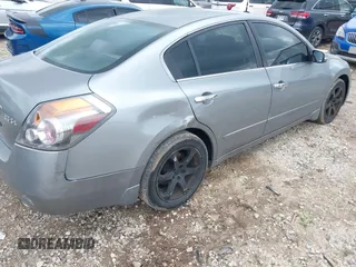 2008 Nissan Altima SE z VIN 1N4BL21E58C210986, wystawiony jako IAAI lot #42322119 z przebiegiem 154 546 mil mil oraz . Historia ofert i sprzedaży dostępna na DreamBid. Obrazek 6.