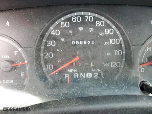 2000 Ford Crown Victoria with VIN 2FAFP73WXYX157746, listed as a Copart auction lot 82748804 with 56,820 mi miles and Salvage Title. Bid and sale history available at carsss.com. Image 9.
