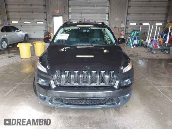 2014 Jeep Cherokee Latitude with VIN 1C4PJMCS0EW291135, listed as a IAAI auction lot 41860372 with 171,524 mi miles and . Bid and sale history available at DreamBid. Image 12.