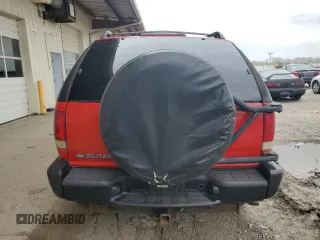 2001 Chevrolet Blazer LS z VIN 1GNCT18W71K247094, wystawiony jako Copart lot #53748065 z przebiegiem 145 695 mil mil oraz Szkoda całkowita • Salvage title. Historia ofert i sprzedaży dostępna na DreamBid. Obrazek 6.