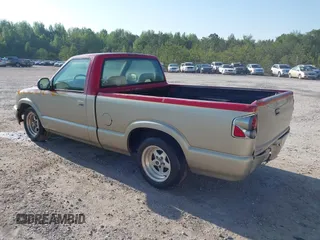 1996 GMC Sonoma SLS with VIN 1GTCS14X4T8515402, listed as a IAAI auction lot 42137071 with 165,316 mi miles. Bid and sale history available at carsss.com. Image 3.