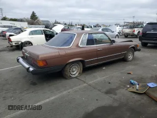 1979 Mercedes-Benz SLC с VIN 10702412025628, выставлен на аукционе Copart как лот 42388515 с пробегом 167 898 миль миль и Списание • Salvage title. История ставок и продаж доступна на DreamBid. Изображение 3.