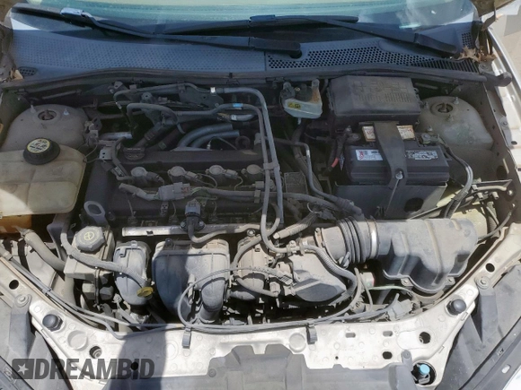 2006 Ford Focus S with VIN 1FAFP34N26W225772, listed as a Copart auction lot 62657045 with 117,078 mi miles and Salvage title. Bid and sale history available at DreamBid. Image 11.