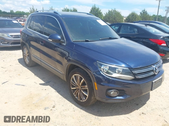 2012 Volkswagen Tiguan SE with VIN WVGAV7AX7CW534703, listed as a IAAI auction lot 42463358 with 119,699 mi miles and . Bid and sale history available at DreamBid. Image 1.