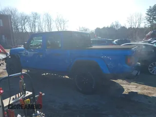2021 Jeep Gladiator Willys with VIN 1C6HJTAG3ML572690, listed as a IAAI auction lot 41649907 with 74,734 mi miles and . Bid and sale history available at DreamBid. Image 15.