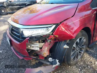 2022 Honda Odyssey EX-L with VIN 5FNRL6H73NB034607, listed as a IAAI auction lot 41238103 with 57,868 mi miles and . Bid and sale history available at DreamBid. Image 6.