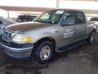 2003 Ford F-150 XLT with VIN 1FTRW07693KA29179, listed as a IAAI auction lot 41726462 with 191,365 mi miles. Bid and sale history available at carsss.com. Image 2.