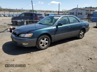 1997 Lexus ES 300 Luxury Sport Sdn with VIN JT8BF22G9V0050351, listed as a Copart auction lot 52082575 with 201,831 mi miles and Salvage Title. Bid and sale history available at carsss.com. Image 1.