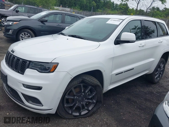 2021 Jeep Grand Cherokee High Altitude with VIN 1C4RJFCG0MC729006, listed as a IAAI auction lot 42486088 with 76,287 mi miles and . Bid and sale history available at DreamBid. Image 2.