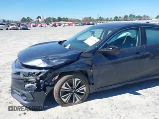 2016 Honda Civic EX-L with VIN 19XFC1F72GE044319, listed as a IAAI auction lot 41823220 with 129,868 mi miles and . Bid and sale history available at DreamBid. Image 6.
