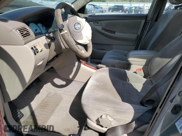 2004 Toyota Corolla CE with VIN 1NXBR32E74Z240293, listed as a Copart auction lot 52624445 with 299,999 mi miles and Salvage Title. Bid and sale history available at DreamBid. Image 7.