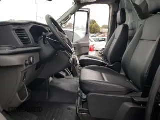 2024 Ford Transit Cargo with VIN 1FTBR1C86RKA98779, listed as a Copart auction lot 70473944 with 35 mi miles and Salvage Title. Bid and sale history available at DreamBid. Image 7.