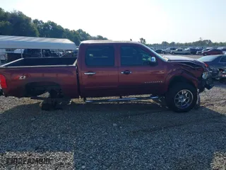 2008 Chevrolet Silverado 1500 LT w/1LT with VIN 2GCEK13J181246470, listed as a IAAI auction lot 40390209 with 195,631 mi miles. Bid and sale history available at carsss.com. Image 14.