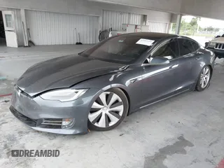 2021 Tesla Model S Long Range Plus with VIN 5YJSA1E28MF421655, listed as a IAAI auction lot 42407234 with 111,443 mi miles and . Bid and sale history available at DreamBid. Image 2.