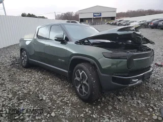 2024 Rivian R1T Adventure z VIN 7FCTGCAA1RN030829, wystawiony jako Copart lot #81459854 z przebiegiem Nie podano mil oraz Szkody całkowita. Historia ofert i sprzedaży dostępna na DreamBid. Obrazek 4.