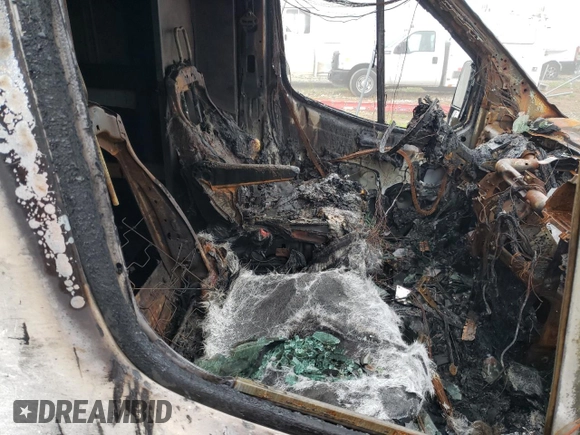 2023 Ford Transit Cargo with VIN 1FTBR2X85PKA25531, listed as a Copart auction lot 61693595 with Not provided miles and Salvage title. Bid and sale history available at DreamBid. Image 11.
